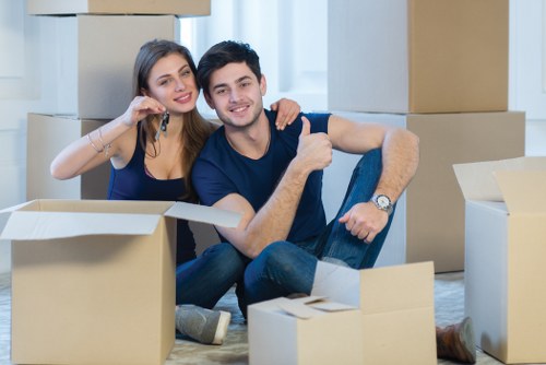 Moving team handling boxes during a UK removal service