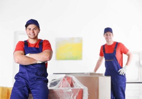 Moving team preparing equipment and safety gear before a house move