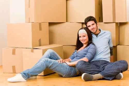 Trained movers in Lambeth handling household items carefully