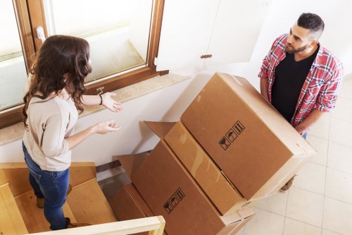 Boxes and furniture loaded by cubic-yard estimate for a local removals job