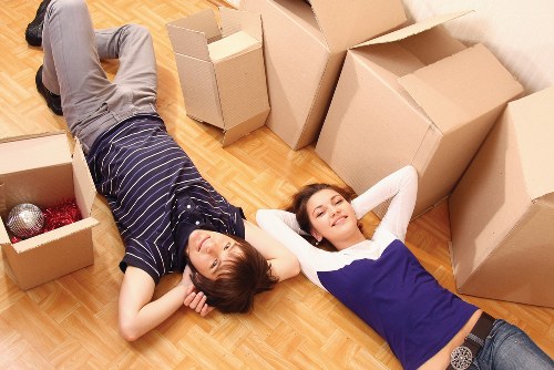 Packed office equipment and furniture ready for commercial move in Lambeth