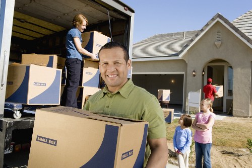 Local moving van loading furniture and boxes