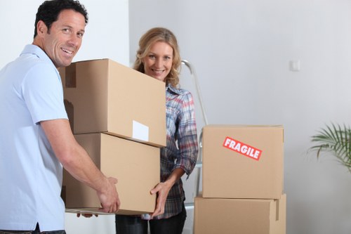 Local movers explaining a free no-obligation quote for a Lambeth relocation