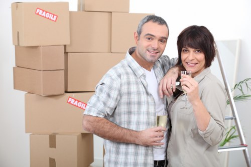 Packed boxes and protected furniture ready for a flat move in Lambeth
