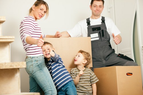 Same-day removals team preparing boxes and furniture for transport